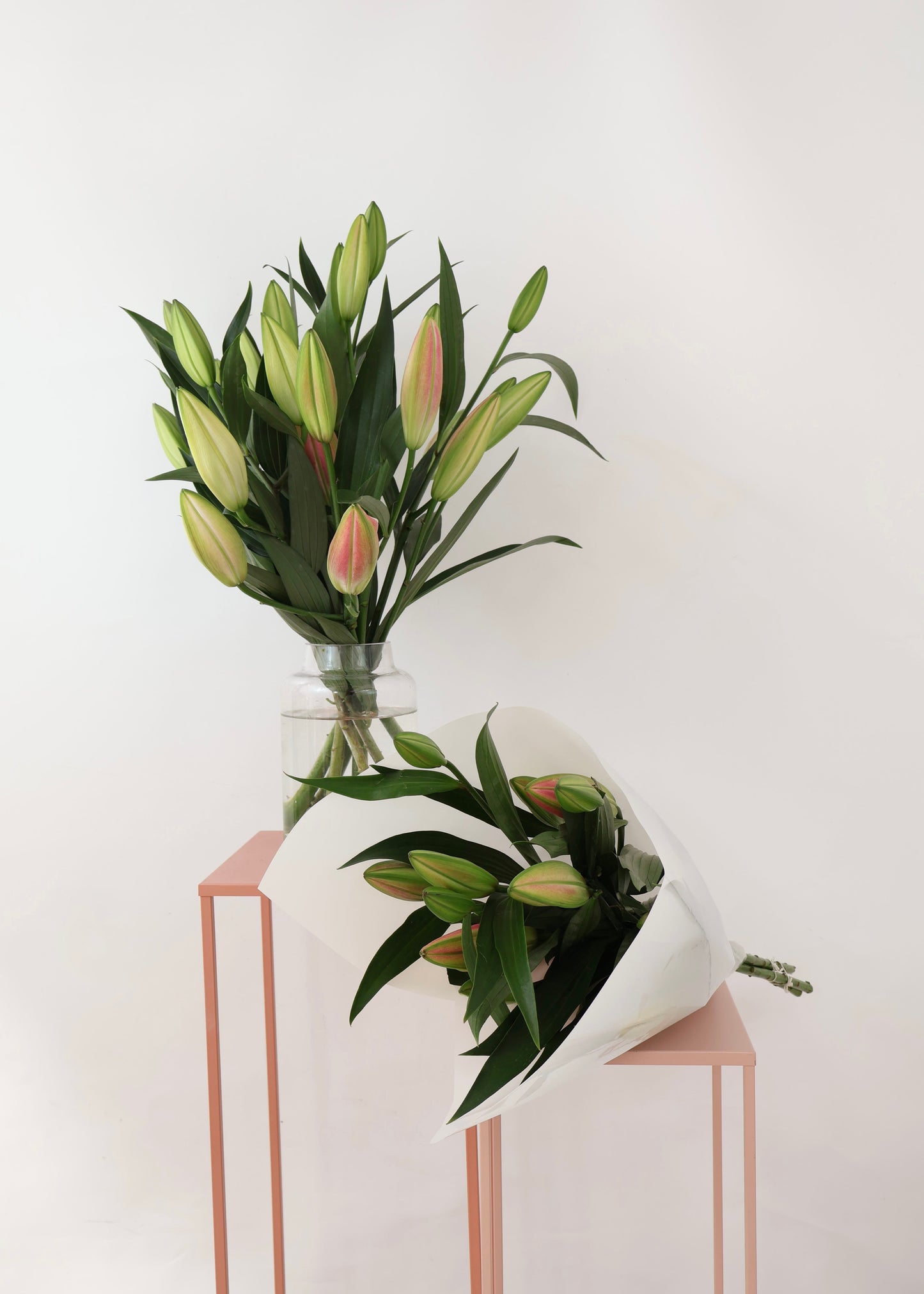 Oriental lily bouquet in white wrapping