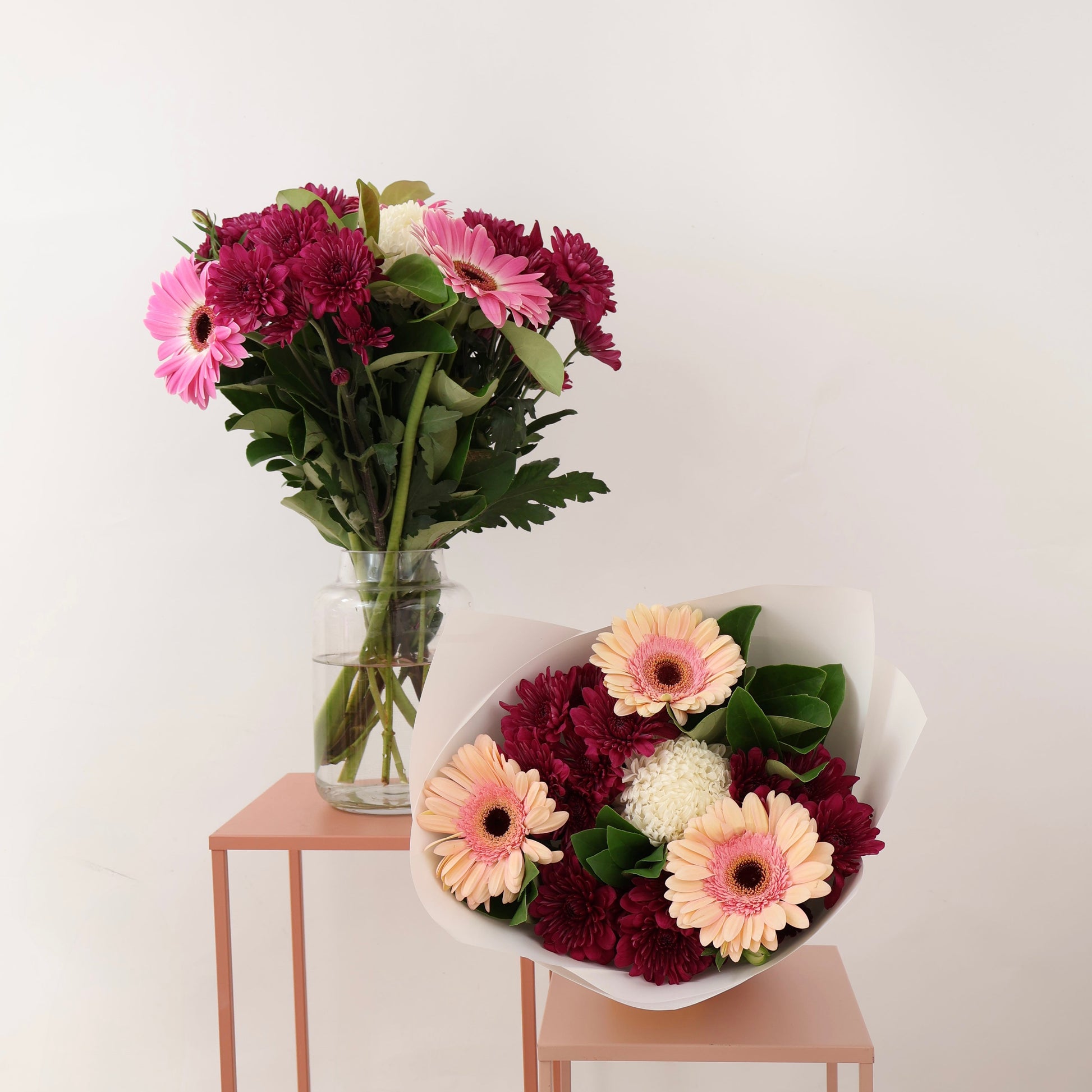 Signature fresh flower bouquet in white wrapping.
